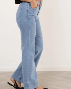 Jean large bas revers